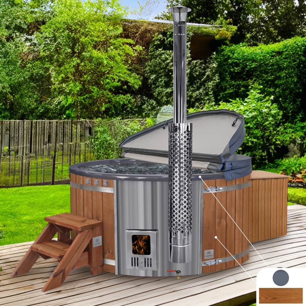 A round wood fired hot tub with integrated filtration system and ThermoWood cladding, displayed in an outdoor setting.