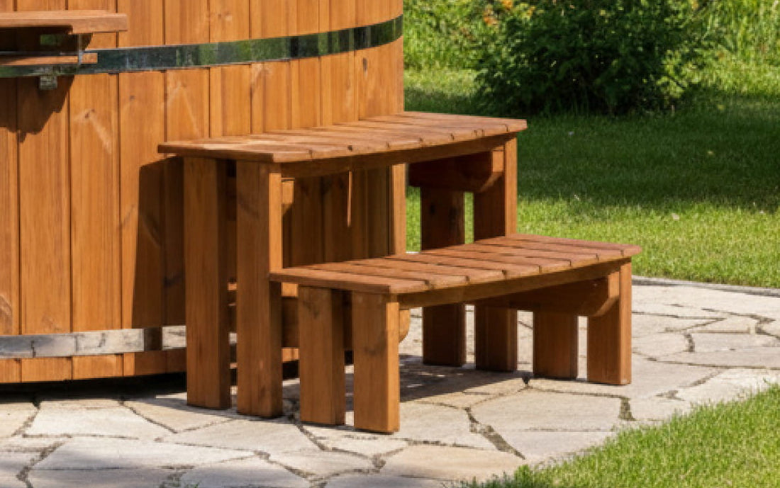 Wooden steps of hot tub in a garden setting