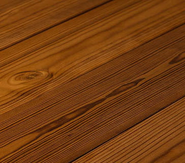 Close-up of a ThermoWood surface with visible grain and texture